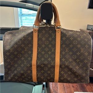 Louis Vuitton Keepall 50. Vintage. Lot’s of life left!